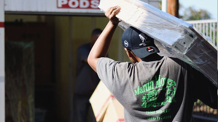 mover carries a mattress